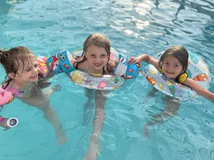 Children With Floaties In Ground Pool Ball Ground