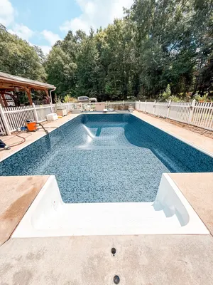 Empty In Ground Pool New Liner White Fence