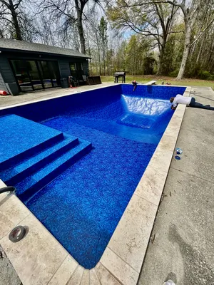 Worker Smoothing New Blue Pool Liner Ball Ground