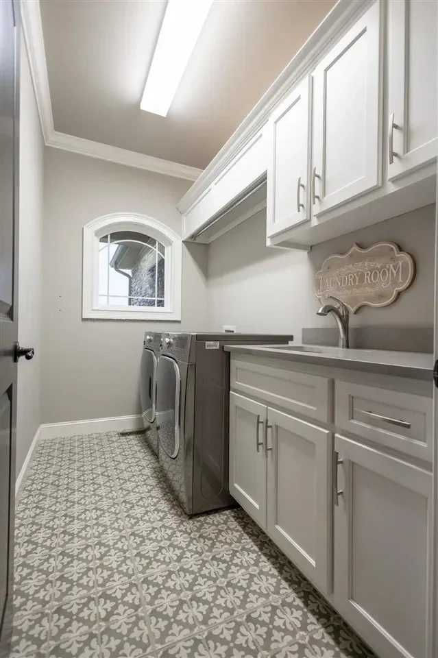 Remodeled Laundry Room White Cabinets project in Oklahoma City, OK