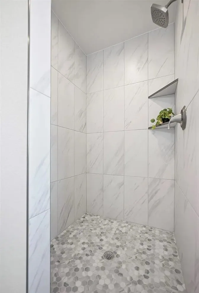Remodeled Shower Marble Tile project in Oklahoma City, OK