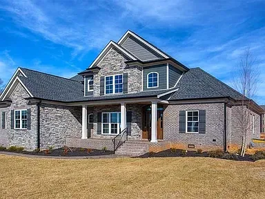 Stone Brick Home Roofing 2 project in Oklahoma City, OK