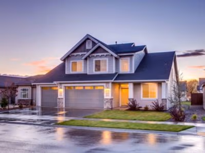 Suburban Home Exterior Dusk Replacement Windows
