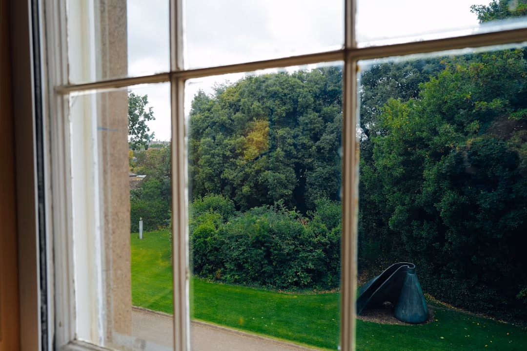 Worn Grille Window Interior Garden View