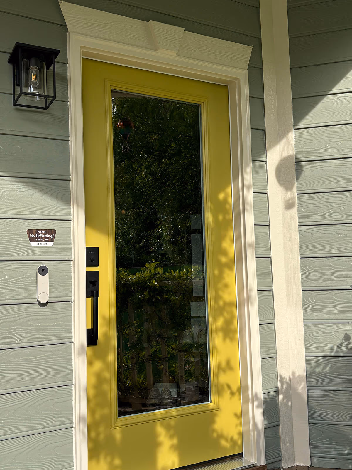 Yellow Full Glass Entry Door Gray Siding